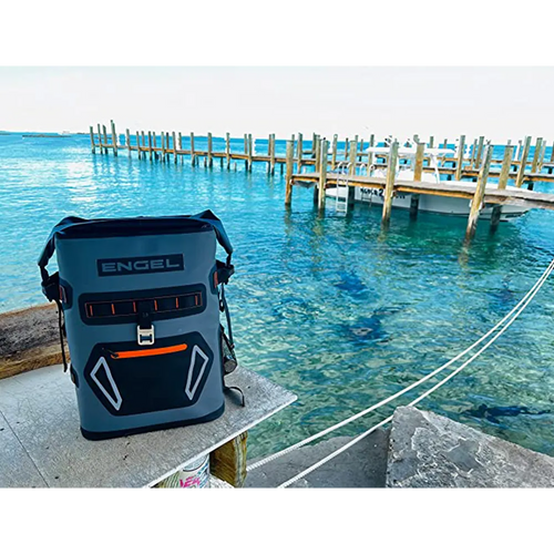 Engel Roll Top High Performance Backpack cooler sitting on table on pier.