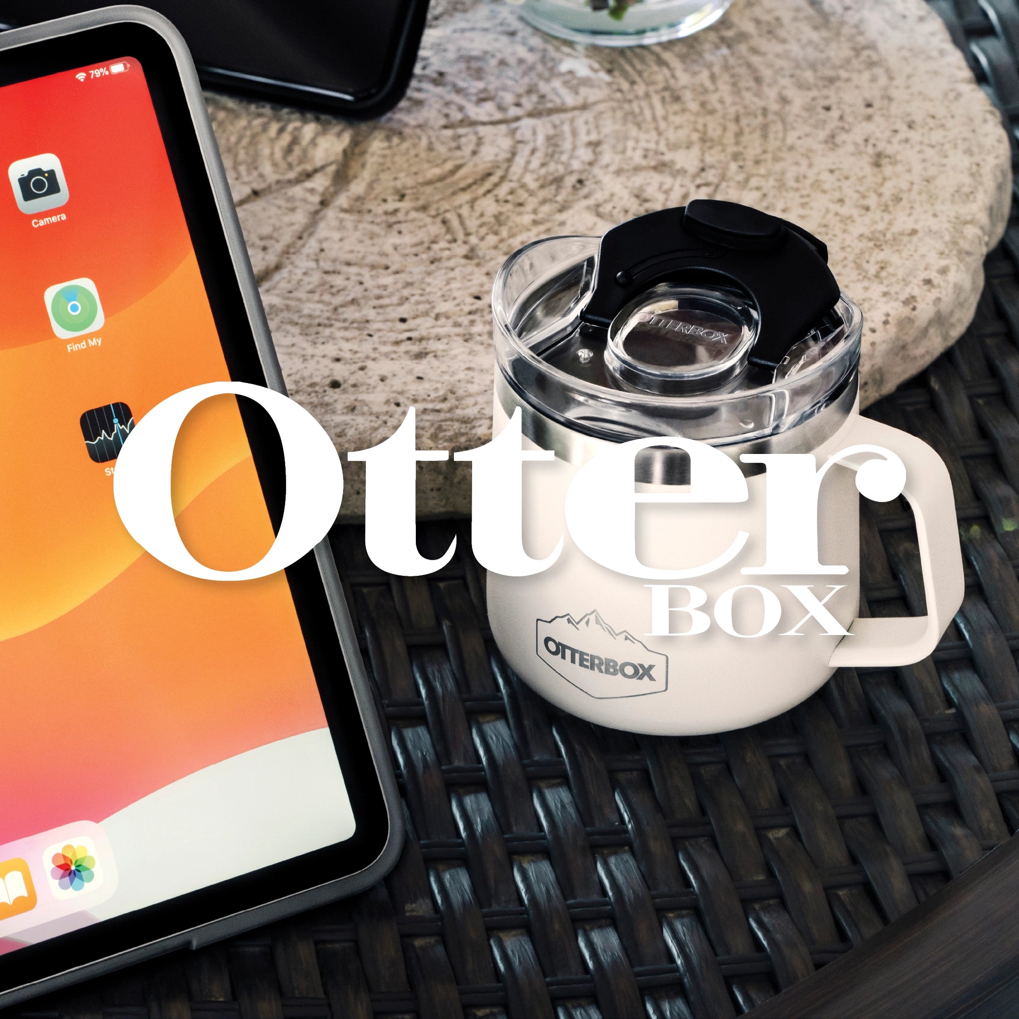 Otterbox Elevation Mug in white sitting on desk next to iPad