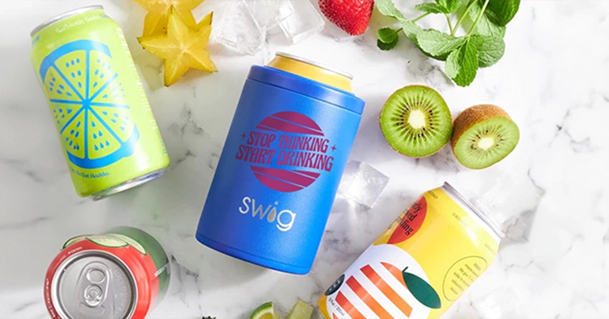 personalized insulated swig can holder with red printed design.  can holder is laying with loose cans on a kitchen counter.