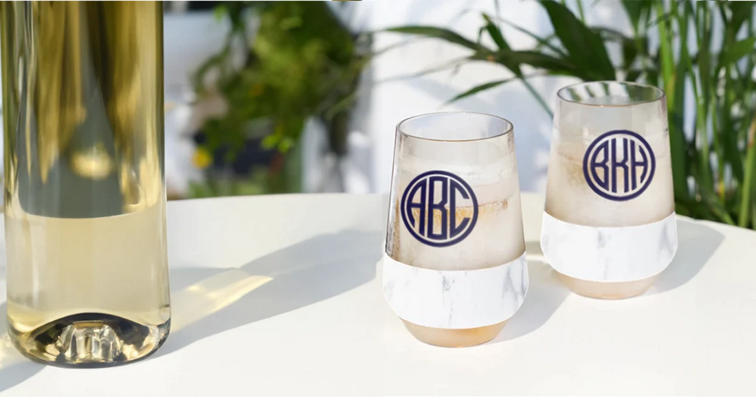 Custom monogrammed drinkware showing freezable wine cups and 3 letter circular monograms