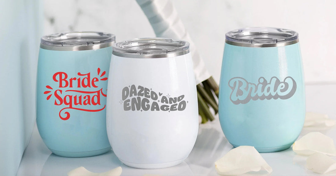 3 insulated wine tumblers from swig.  personalized with "bride squad", "dazed and engaged", and "Bride" in cursive font.