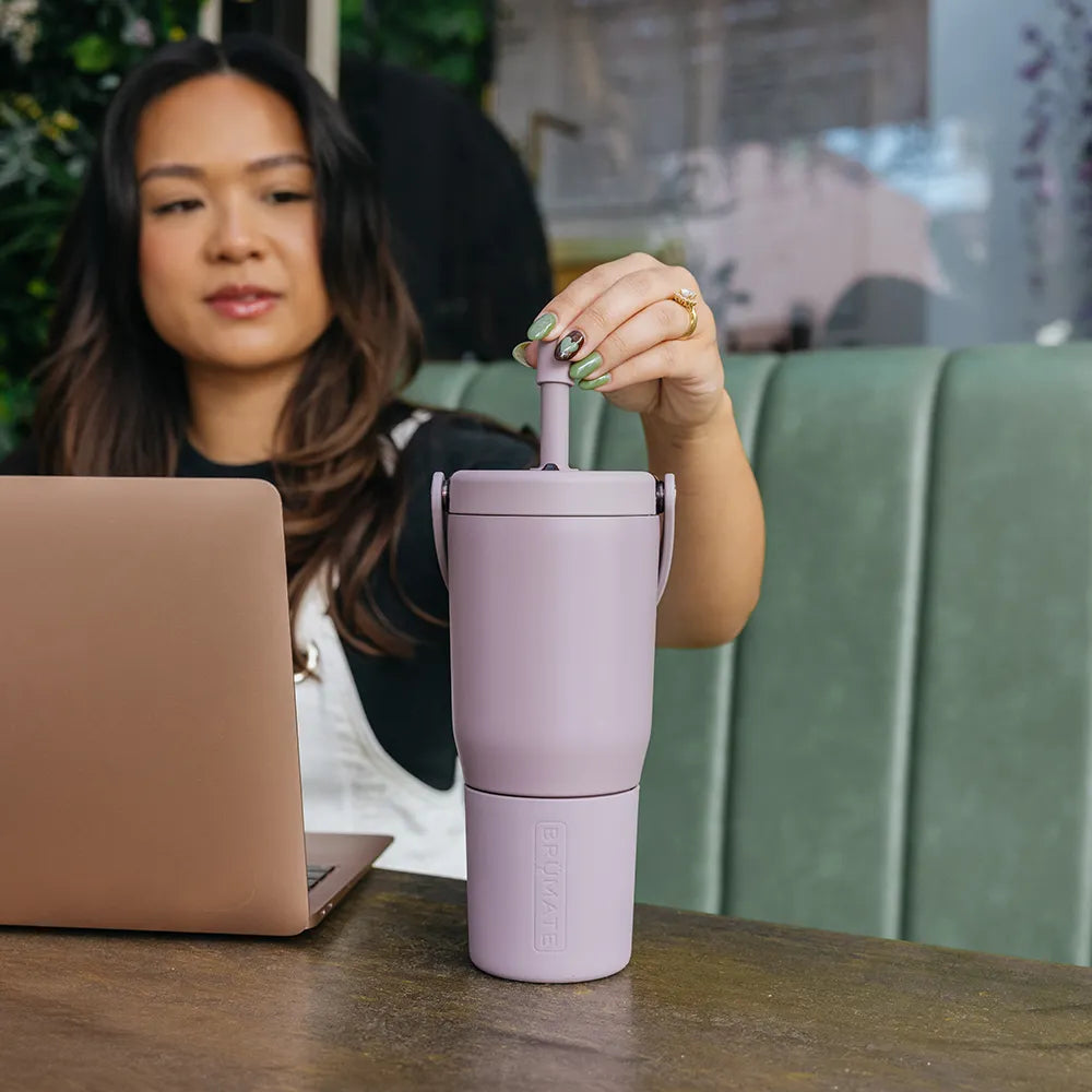 Woman at cafe with Brumate Resa Tumbler