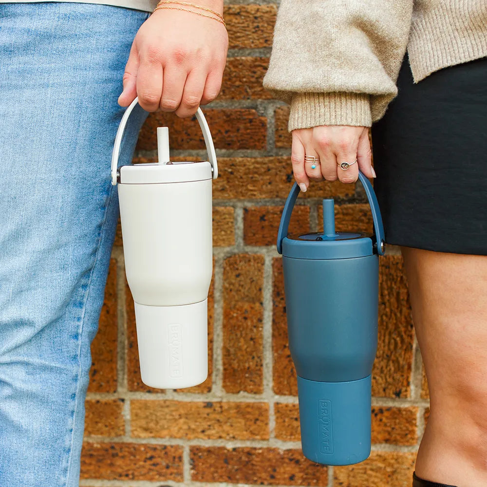 People holding Brumate Resa Tumblers by lid handle. 