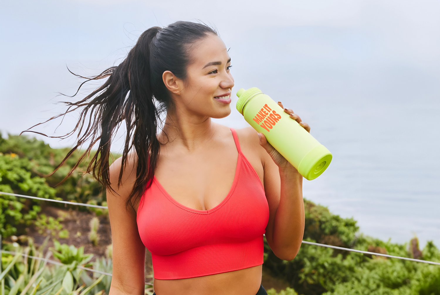 women drinking out of a takeya bottle