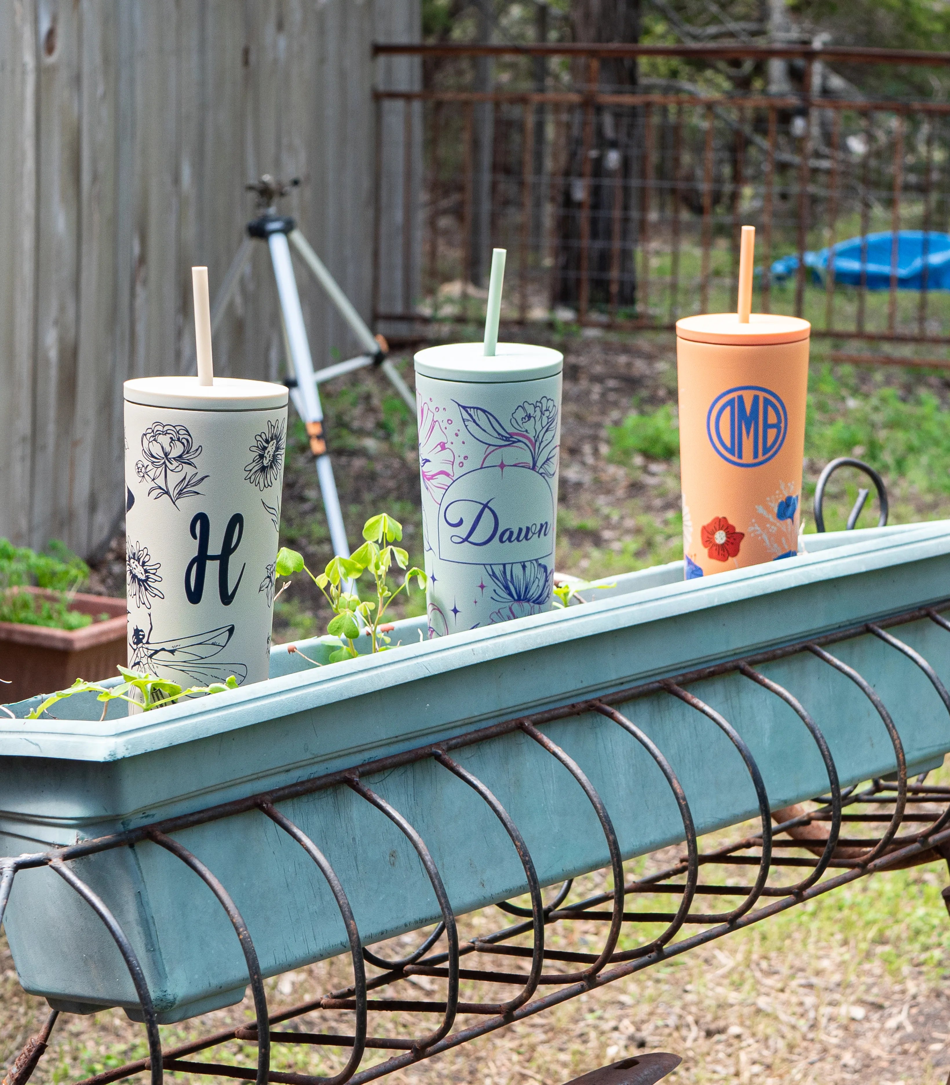 garden scene with personalized mothers day straw tumblers