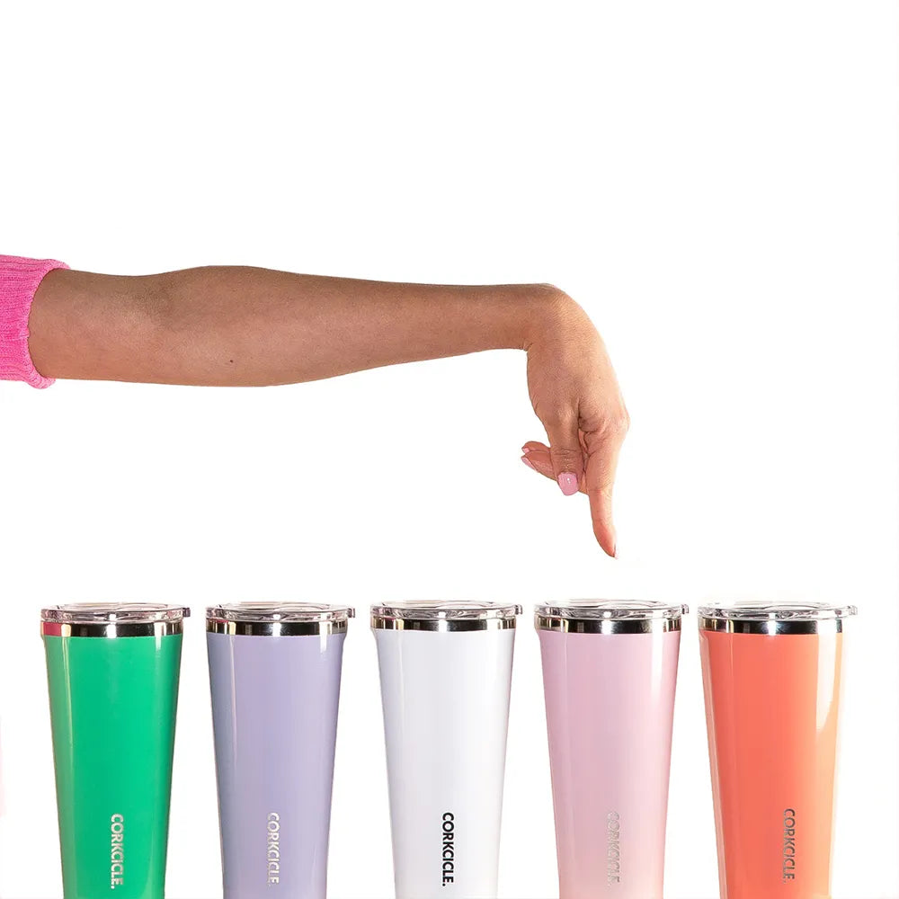 Line of Corkcicle tumblers with someone pointing out one of the tumblers.