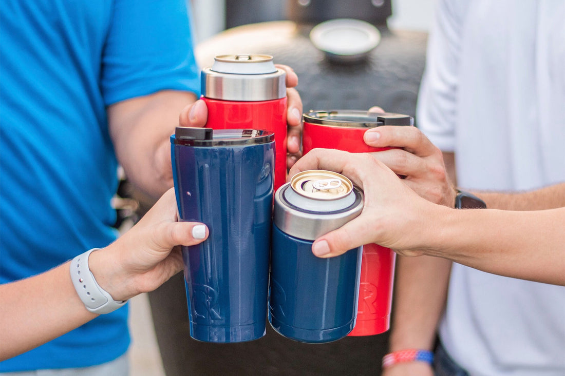 People holding blue and red insulated can holders and tumblers together.