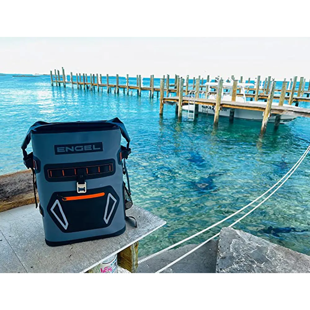 Engel Roll Top High Performance Backpack cooler sitting on table on pier.