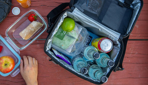 Above view of RTIC Everyday cooler filled with drinks and snacks