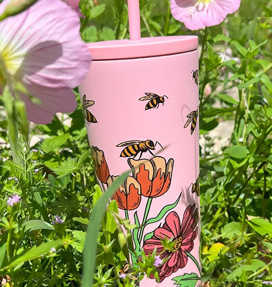 classic straw tumbler wrap butterfly design, in a garden of pink primrose