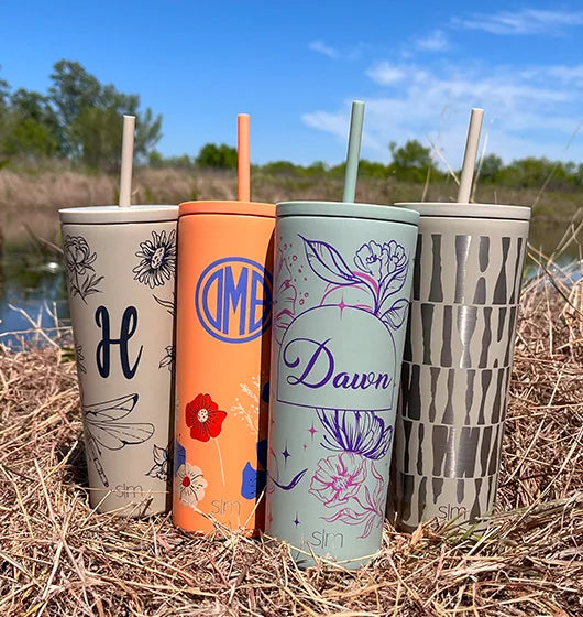 personalized mother's day classic tumblers, sitting by a pond