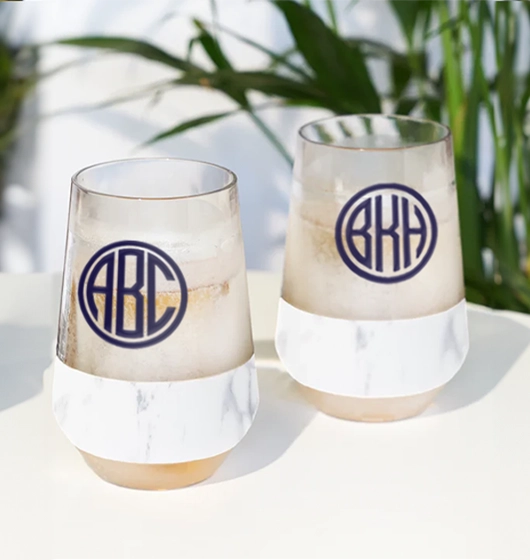 Custom monogrammed drinkware showing freezable wine cups and 3 letter circular monograms