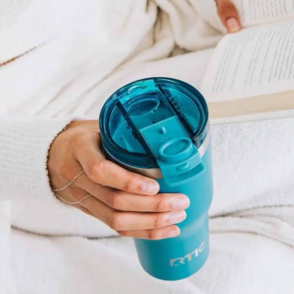 Woman holding RTIC Essential Tumbler.