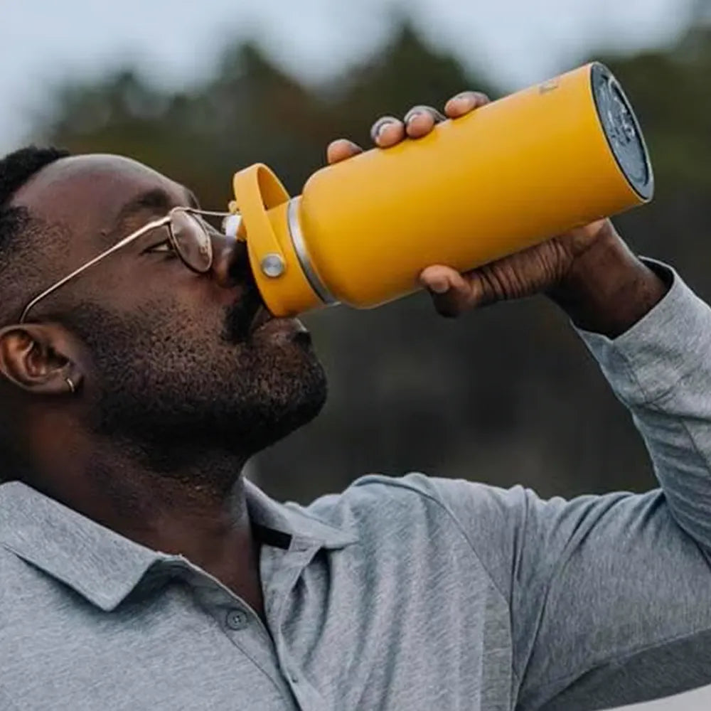 Man drinking from RTIC Outback Bottle.