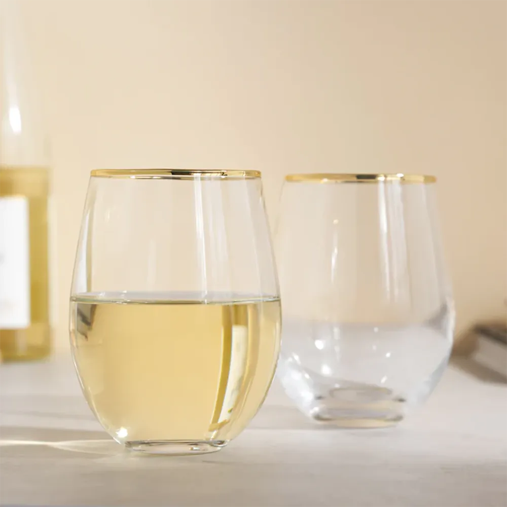 Twine Living Co. Stemless Wine glasses with one filled with wine.