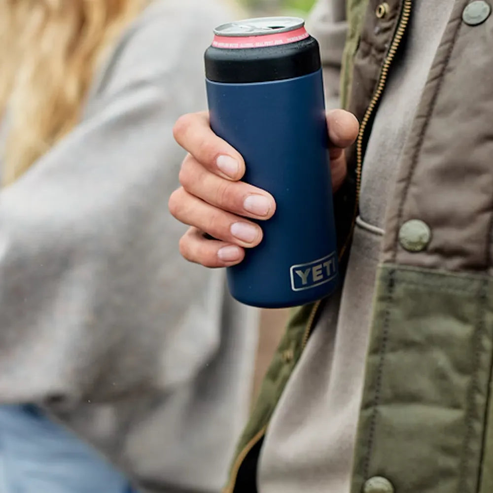 Person Holding Yeti 12 oz Colster Slim Can Cooler in Navy.