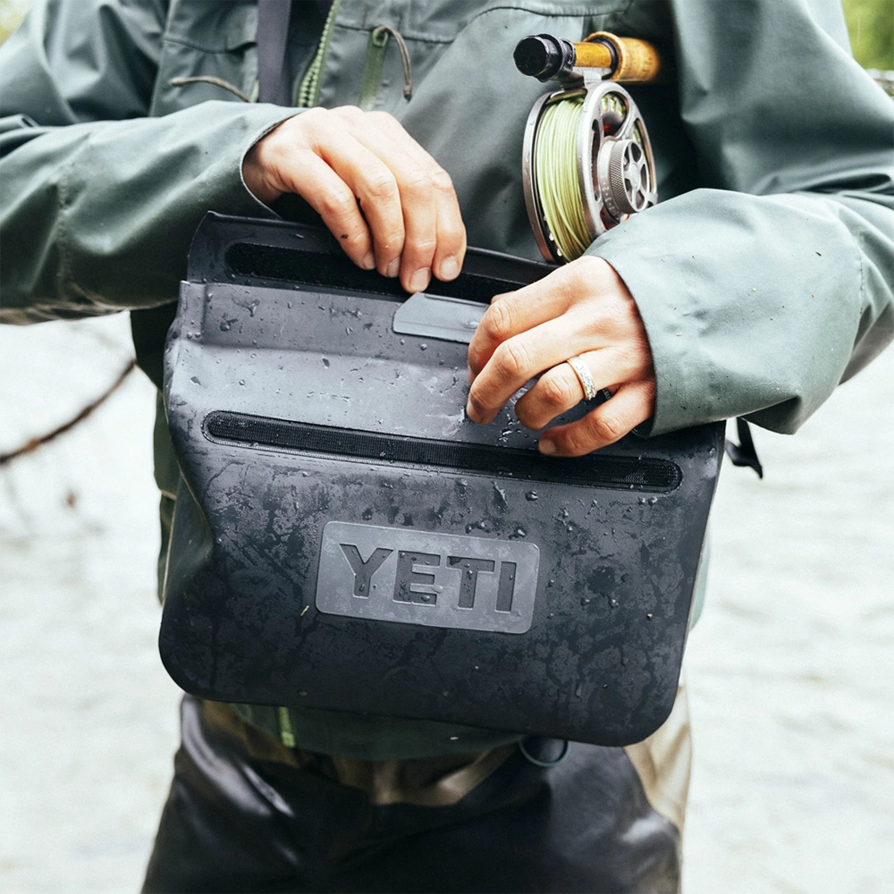 Person opening 3 liter Yeti SideKick.
