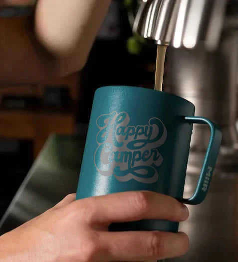a customized miir camp cup being filled up