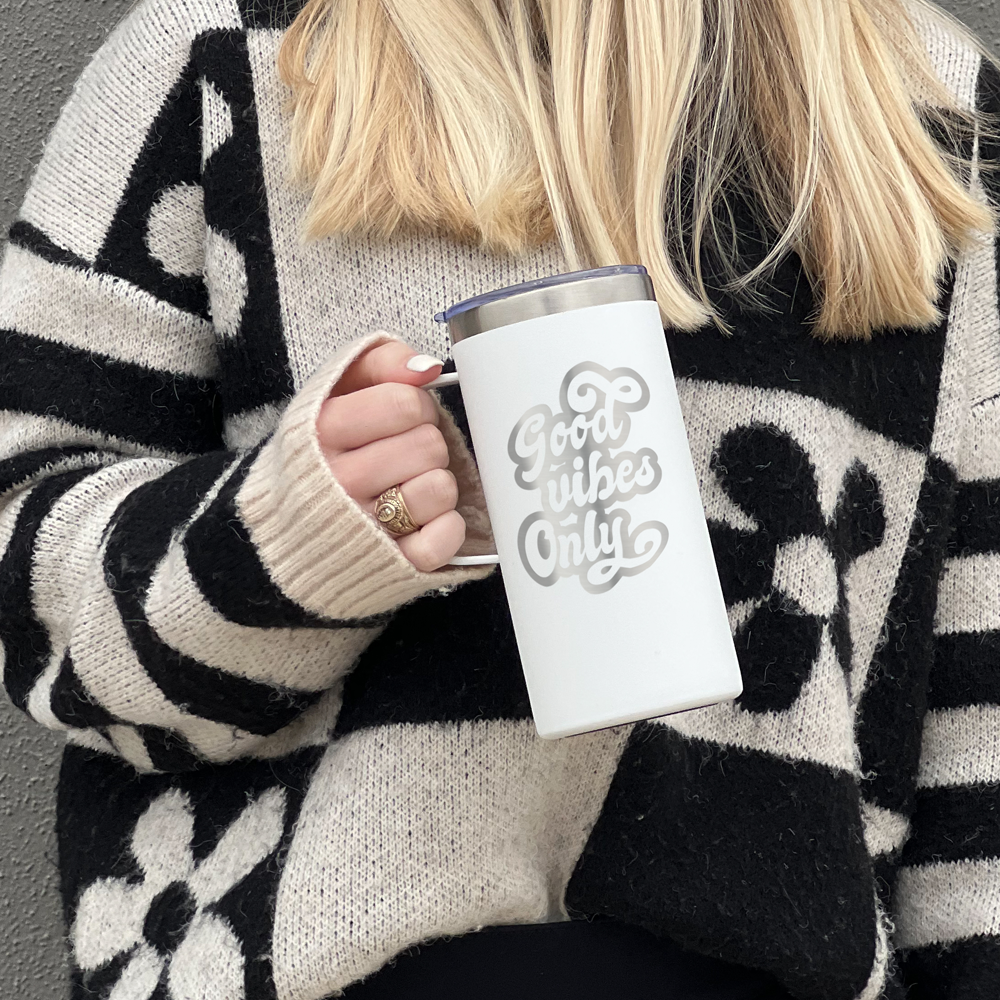 white rtic travel mug with custom engraving that reads good vibes only