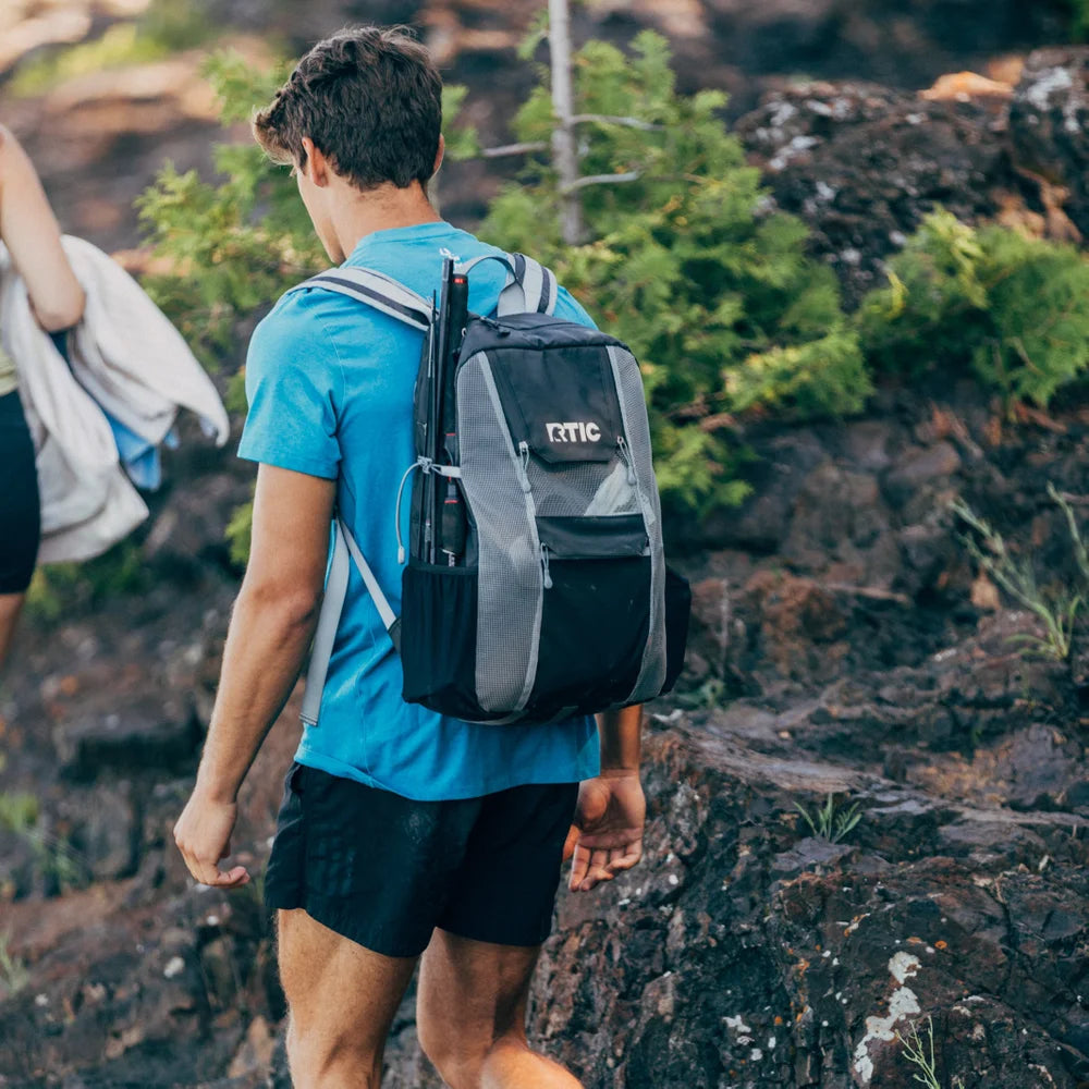 Man hiking with RTIC chillout backpack cooler black