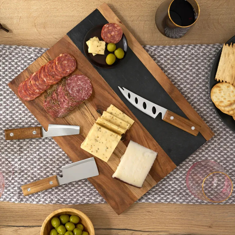 Cheeses and meats on Twine Living Co. Wood and Slate cheese platter.