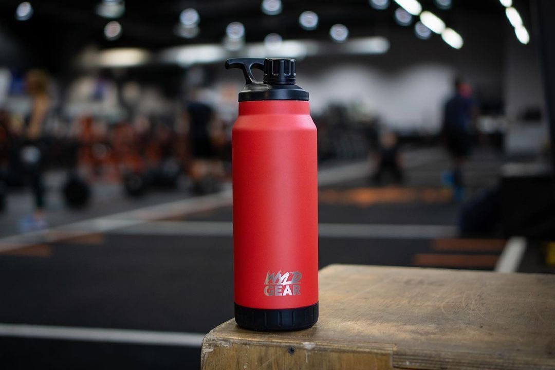 Red Wyld Gear water bottle inside of gym